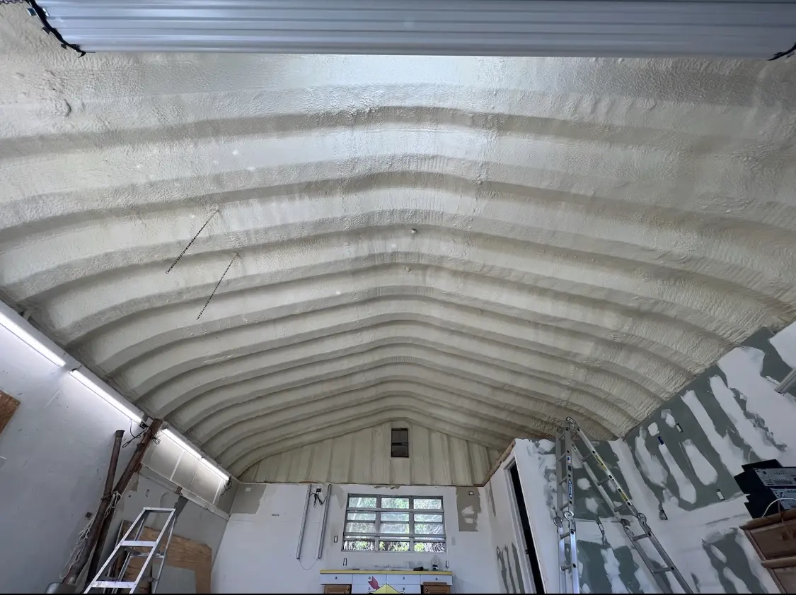 Spray polyurethane foam applied to the underside of a metal roof deck in Jeffersontown